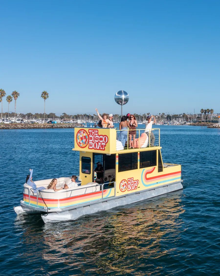Aerial view of the Disco Boat cruising on San Diego Bay
